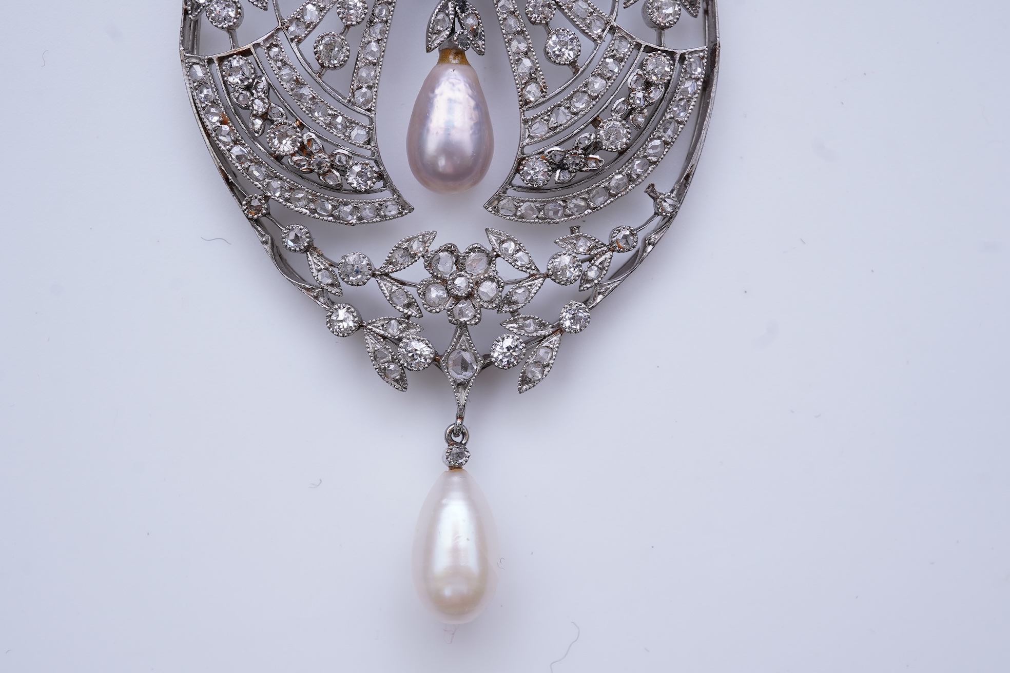 A fine Belle Epoque natural pearl and diamond pendant, circa 1910